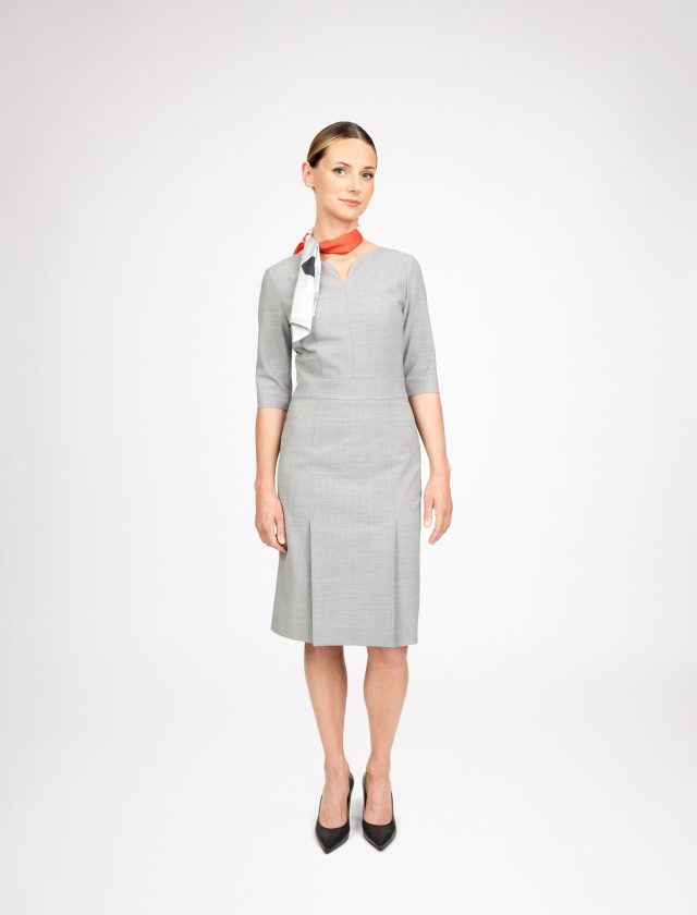 Tailored dress with pleats